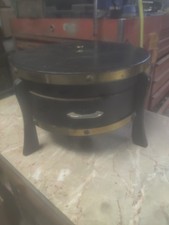 This is a vintage mid-century drum-style musi...