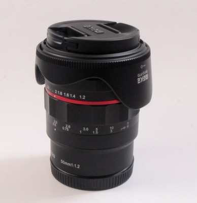 Meike 50mm F 1.2 Manual Focus and Aperture Lens Canon Rf Mount W/Caps and Hood