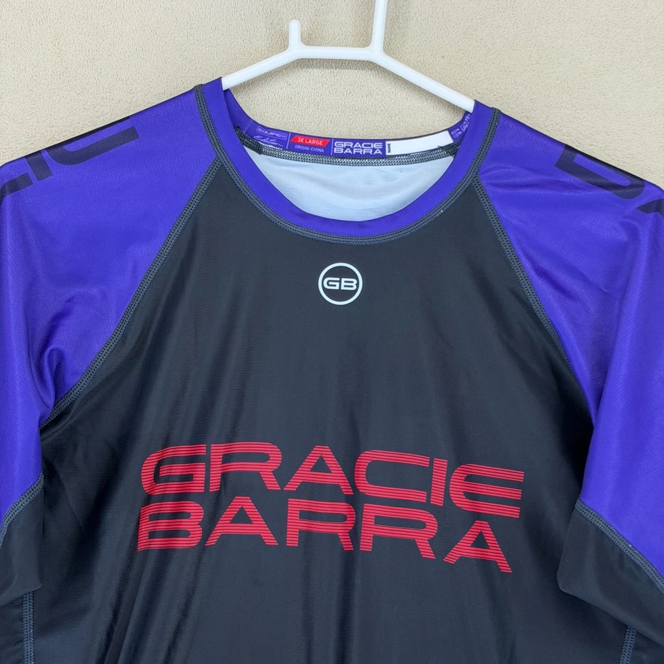 Protector contra erupciones Gracie Barra Jiu Jitsu manga corta negro púrpura 3XL GB Jiu Jitsu Foto 2 de 4