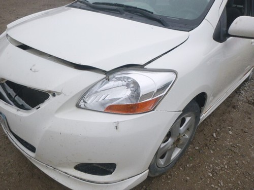 Used Left Headlight Assembly fits: 2007 Toyota Yaris Sdn L. w/o S package Left G