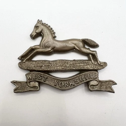 Genuine WW2 West Yorkshire Regiment Plastic Economy Issue Cap Badge