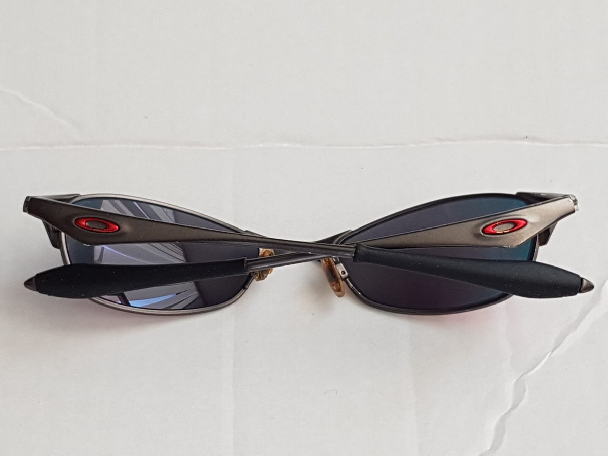 OAKLEY WIRETAP 1.0 SUNGLASSES Pewter Frame With Red Icons & Red