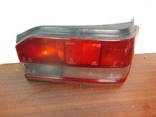 Feu avant (phare) Mazda 323