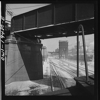 Photo:Snowy Railroad Tracks Industrial Bridge 1900s Train Yard