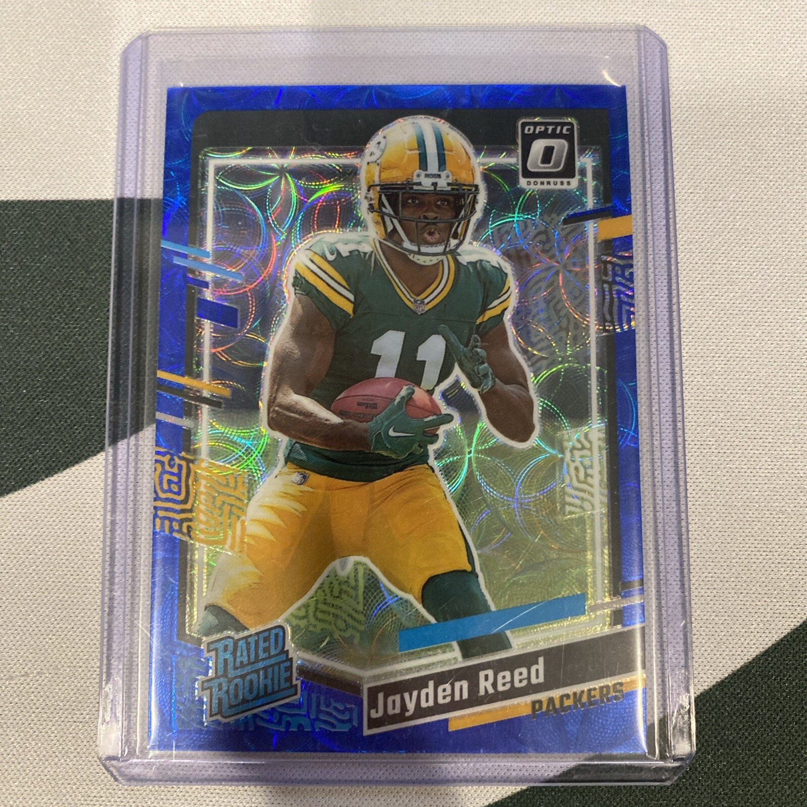 2023 Panini Donruss Optic Rated Rookie Blue Scope Prizm #239 Jayden Reed (RC)