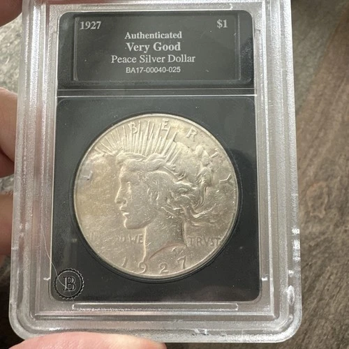 1927 Silver Peace Dollar Uncirculated In Holder Very Good rated