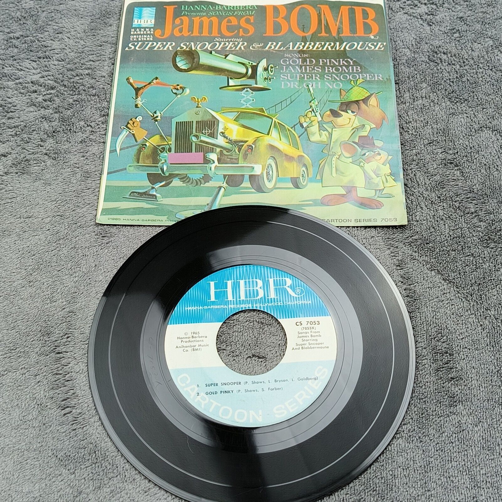 Super Snooper & Blabbermouse Songs From James Bomb 45 RPM Record With Sleeve 