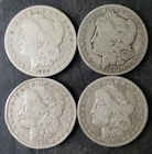 1899 O, 1901 O, 1901 S, and 1902 $1 Morgan Silver Dollars