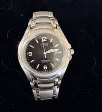 Citizen Eco-Drive Men's Quartz Analog Date 100m Black Dial Titanium Bracelet