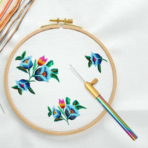 Aiguilles de broderie et point de croix