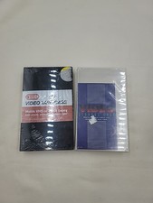 Lot of 2 plastic VHS or Beta tape holders Black and Clear