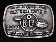 OB27104 VINTAGE 1983 KANSAS TRAPSHOOTERS ASSOCIATION STATE SHOOT BUCKLE