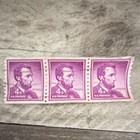 US 4 Cent Abraham Lincoln Purple Postage Stamps Plate Block Strip of 3 — photo 1