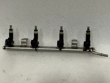 2011 JEEP PATRIOT FUEL INJECTORS WITH RAIL RAMP 04891577AC