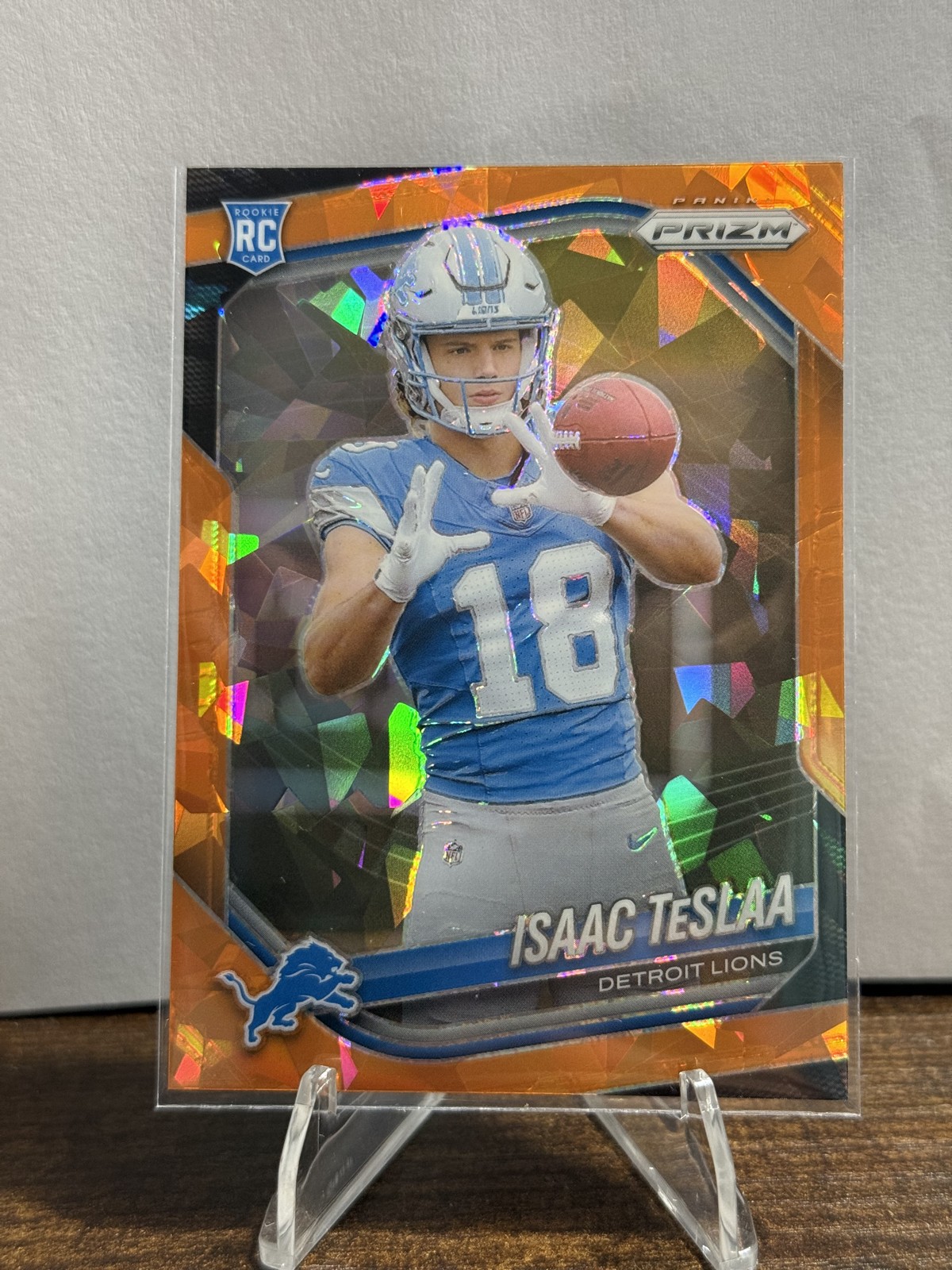 2025 Panini Prizm - Rookies Isaac Teslaa #316 Orange Ice Prizm (RC)