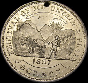 1897 FESTIVAL OF MOUNTAIN & PLAIN MAY SHOE & CLOTHING CO Merchant Token R-DEN-7