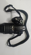 Nikon D3100 DSLR Camera + AF-S DX 18-55mm VR Lens + Charger + Strap – Working