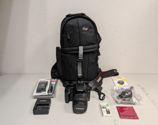 Canon EOS Rebel XS 10.1MP DS126191 Camera w/ EF-S 18-55mm Lens Bundle