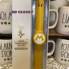 Universal Studios Super Nintendo World Mario Gold Power Up Band. Limited Release