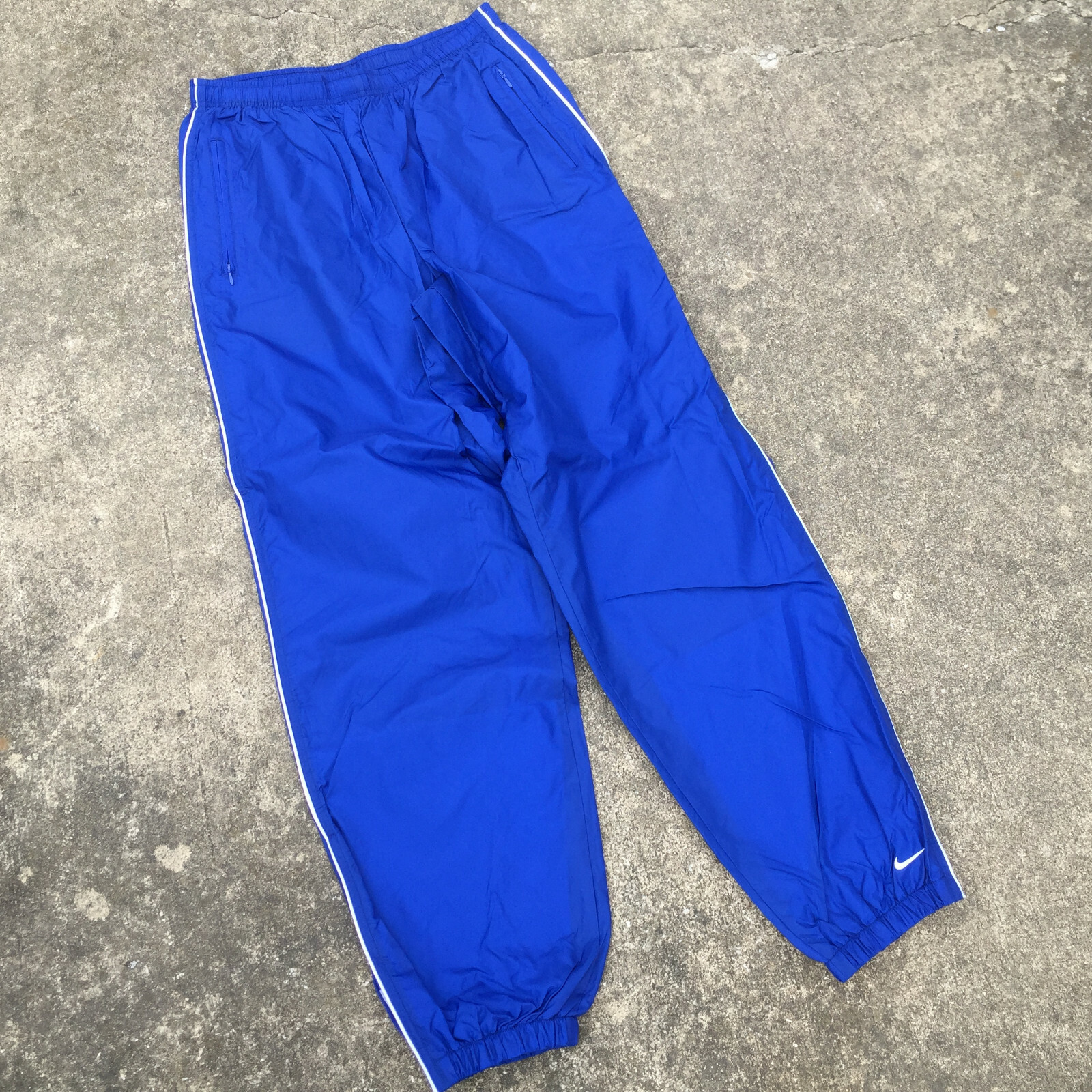nike windbreaker pants blue