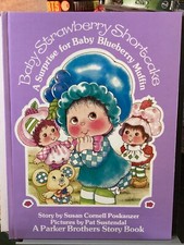 BABY STRAWBERRY SHORTCAKE SURPRISE FOR BLUEBERRY MUFFIN HC 1984 PARKER BROS