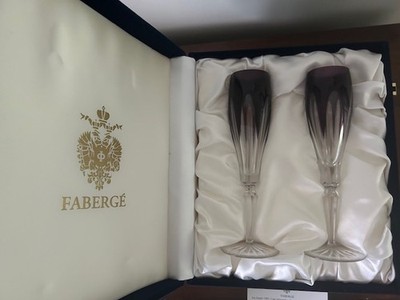 A pair of Faberge Lausanne (2nd edition) champagne flutes