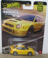 Hot Wheels Thrill Climbers Subaru Impreza WRX Yellow 1:64 Diecast Rubber Tires