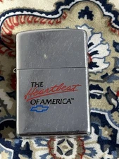 Vintage NOS 1997 Zippo Lighter With "Chevrolet The Hearbeat Of America ￼ (Dent)