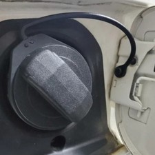 Automotive Fuel Door Tether Cord Silicone Construction Prevents Misplacement