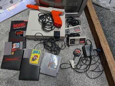 NES bundle: console, controllers, zapper gun, games and cables