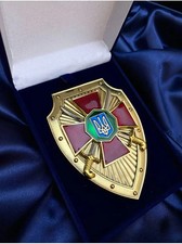 Ukrainian Shield National Guard of Ukraine in a case. With document.