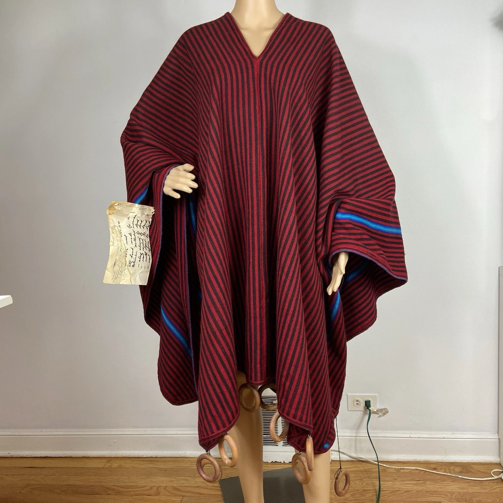 Vtg Bolivian Wool Blend Poncho Thin Blanket Weight Wood Rings Red Black
Opens in a new window or tab