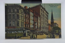 1913 - The Busy Corner, Utica, NY - Vintage Postcard - Trolley/Cigar Shop/Etc