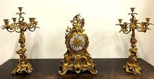 A LARGE GILT BRONZE MANTEL CLOCK GARNITURE. NAPOLEON III. FRANCE. XIX CENTURY