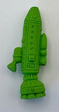 Vintage Diener Rubber Eraser Green CETI-3 Space Raiders Rocket Ship