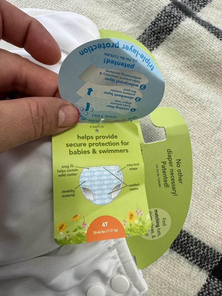 Pañal de natación absorbente reutilizable a presión unisex para bebé Iplay blanco talla 4T Foto 3 de 4