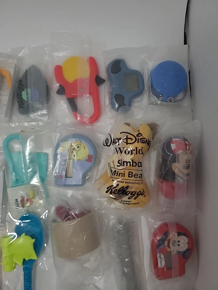 LOTE MIXTO DE COLECCIÓN DE 50 PRIMAS/JUGUETES DE CEREALES SELLADOS Kellogg’s-Disney Etc... Foto 4 de 4