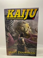 Kaiju Battlefield Surgeon by Matt Dinniman - 2019 Trade PB edition Signed