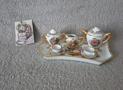 Ensemble à thé miniature en porcelaine artistique F.M label qualité Limoges Fr. - Photo 1/4