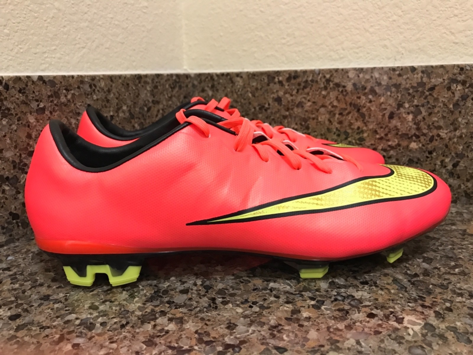 white nike cleats with rainbow