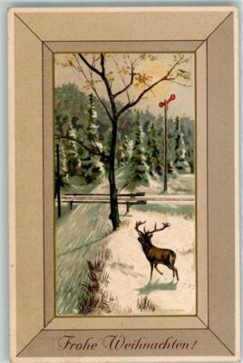 39891350 - A Deer in Front of a Snowy Fir Forest Mat