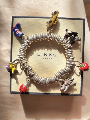 Genuine Links of London bracelet with 7 cute charms in LOL box get the lucky 7 !