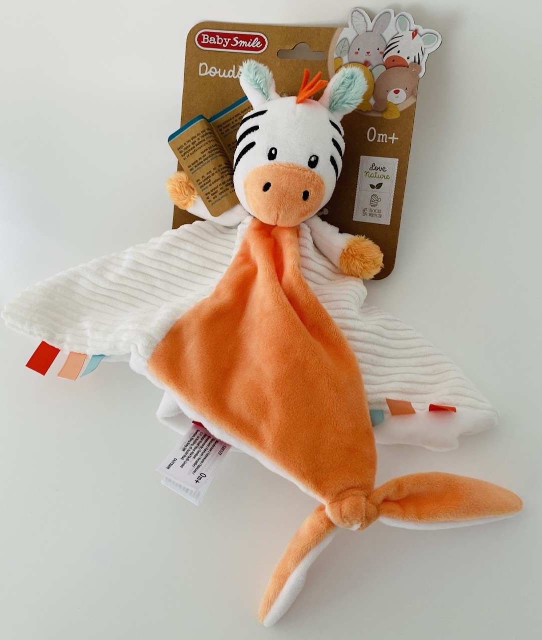 Doudou plat zèbre Baby Smile blanc et bleu pour apaiser les poussées dentaires de votre nourrisson