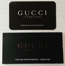 Gucci Timepieces watch original 2 year limited warranty card and book Model 6100
