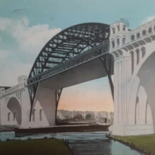 CENTRAL-LORAIN BRIDGE OVER CUYAHOGA RIVER CLEVLAND, OHIO VINTAGE POSTCARD