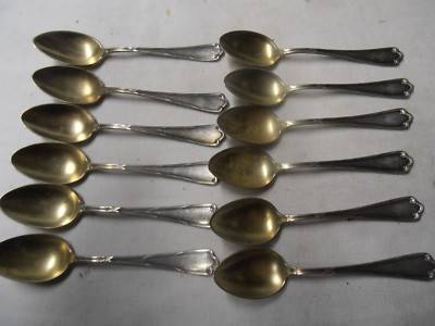 Série de 12 fourchettes et 12 cuillères en métal argenté