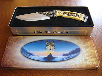 Wild Life Collection - Howling Wolves Carved in Resin Handle Fixed Blade 