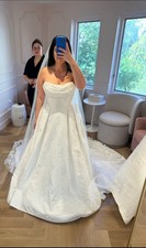 Ivory Strapless Ball Gown Wedding Dress with Train and Button Back Closure
