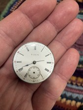 Antiguo movimiento de reloj de bolsillo Elgin 29,5 mm 0s para damas para piezas o reparación