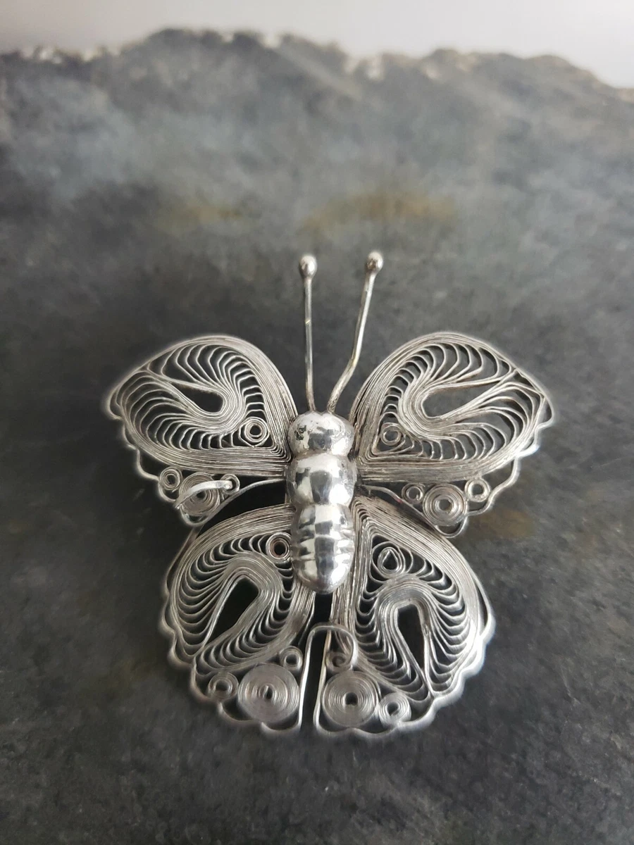Silver filigree butterfly best sale brooch